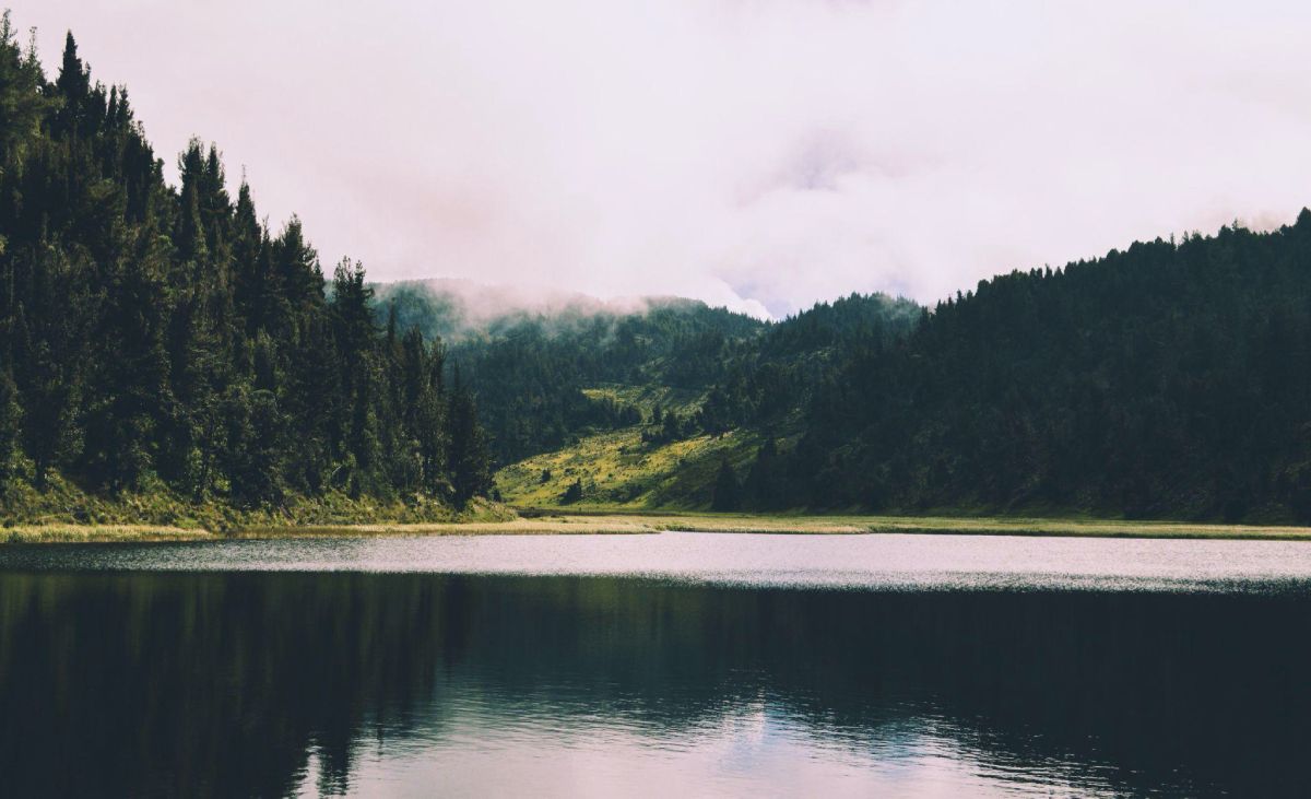 Body of Water near Mountains